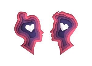 Two layered faces with a heart inside each to represent starting relationship therapy